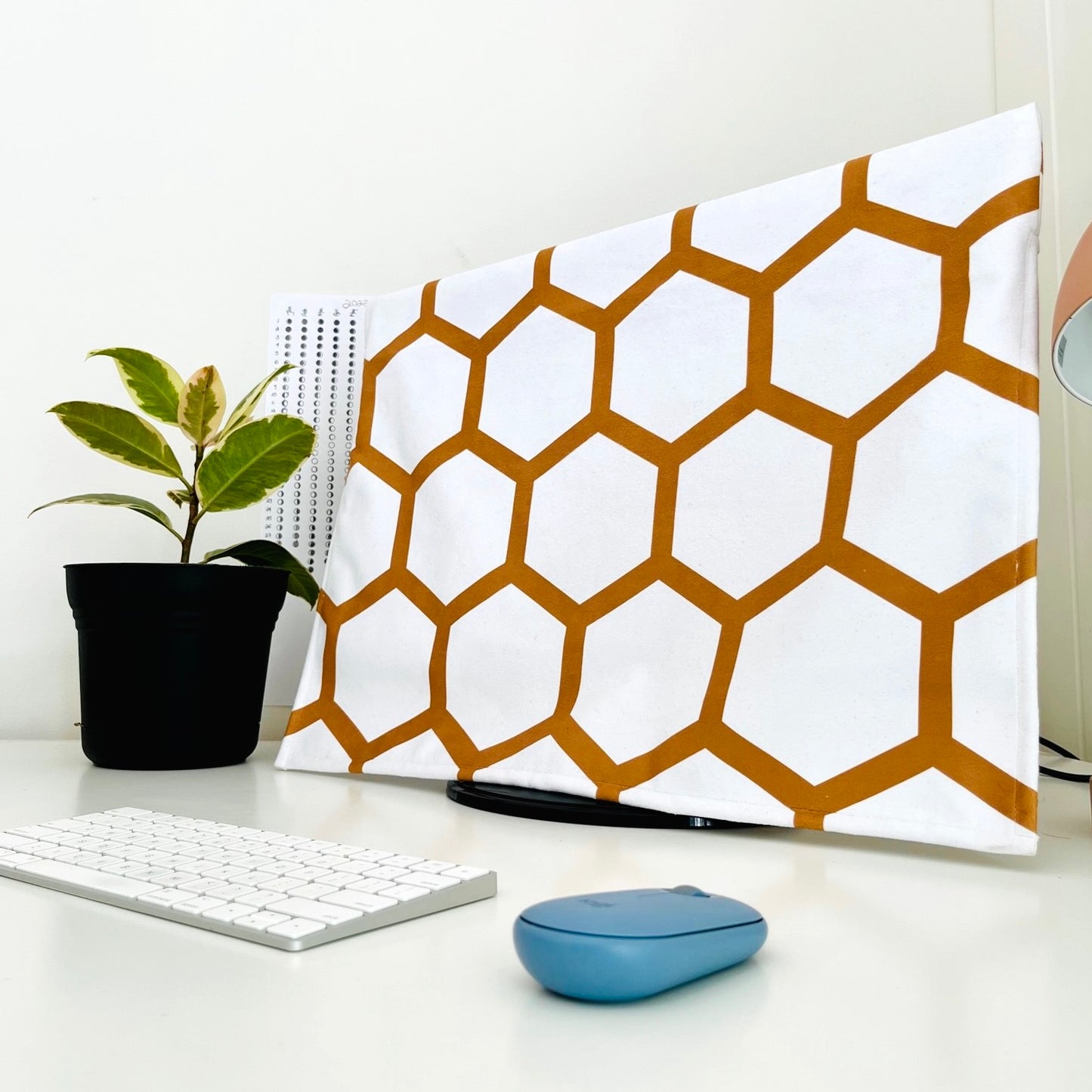 bee free computer monitor cover on a home office computer 